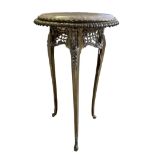 AN EARLY 20TH CENTURY GILT METAL CIRCULAR OCCASIONAL TABLE The inserted marble top above a piece