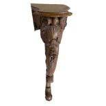 AN 18TH/19TH CENTURY ITALIAN SERPENTINE CARVED WALNUT CONSOLE TABLE Decorated with shells and