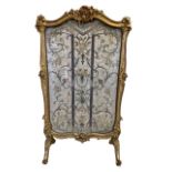 RETAILED BY EDWARDS AND ROBERTS, A LARGE AND IMPRESSIVE 18TH CENTURY LOUIS XV ROCOCO GILTWOOD FIRE