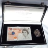 A SILVER COMMEMORATIVE ONE CROWN AND TEN POUND BANKNOTE PROOF SET, DATED 2003 In a protective