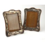 A PAIR OF EDWARDIAN ENGLISH SILVER PICTURE FRAMES Adam's style, glazed, with strut backs. (19cm x