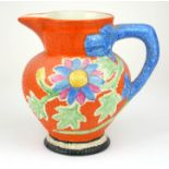 CLARICE CLIFF, A RARE AND UNUSUAL JUG In 'Nuage' pattern, in Dragon shape (called Dragon shape due