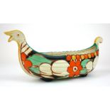 CLARICE CLIFF, FANTASQUE RANGE, A FLOWER HOLDER FORMED AS A LONG VIKING BOAT, CIRCA 1928 - 1929