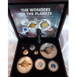 A WONDERS OF THE PLANETS PROOF COIN SET Eight coins featuring the planets of the solar system, in