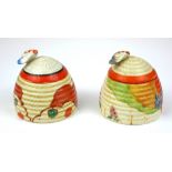 CLARICE CLIFF, A HONEY POT AND COVER, CIRCA 1933 In 'Winbells' pattern, depicting a sinuous tree