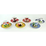 A SET OF SIX CLARICE CLIFF DESIGN BONE CHINA COFFEE CANS AND SAUCERS In 'Autumn', 'May Avenue', '