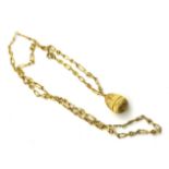 STUART DEVLIN, AN 18CT GOLD LOCKET CONCEALING AN OYSTER WITH NATURAL PEARL Suspended from an 18ct