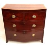 WITHDRAWN A GEORGIAN MAHOGANY AND SATIN BANDED BOW FRONT CHEST OF TWO SHORT OVER TWO LONG DRAWERS