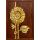 A MID 20TH CENTURY CARVED GILTWOOD SUNFLOWER PLAQUE On hardwood mounted and framed. (51.5cm x