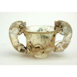A CHINESE ROCK CRYSTAL FIGURAL CUP Twin handles carved with temple lions. (approx 10cm x 5.5cm)