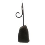 A 17TH/18TH CENTURY WROUGHT IRON RUSH LIGHT On a wooden block. (29cm) Condition: in good order in