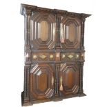 AN IMPRESSIVE 17TH CENTURY DUTCH OAK CABINET With dentil cornice above four ribbed panelled doors