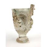 A CHINESE ROCK CRYSTAL WINE CUP Carved with a dragon and engraved decoration. (approx 10cm)