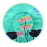 CLARICE CLIFF, BIZARRE RANGE, A POTTERY CABINET PLATE In 'Inspiration Lily' pattern, painted in