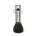 AN EARLY 18TH CENTURY PRIMITIVE IRON AND WOOD CANDLESTICK. (20cm) Condition: good in accordance with