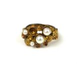 STUART DEVLIN, AN 18CT GOLD ORGANIC FORM RING SET WITH PEARLS (size O). Condition: three pearls
