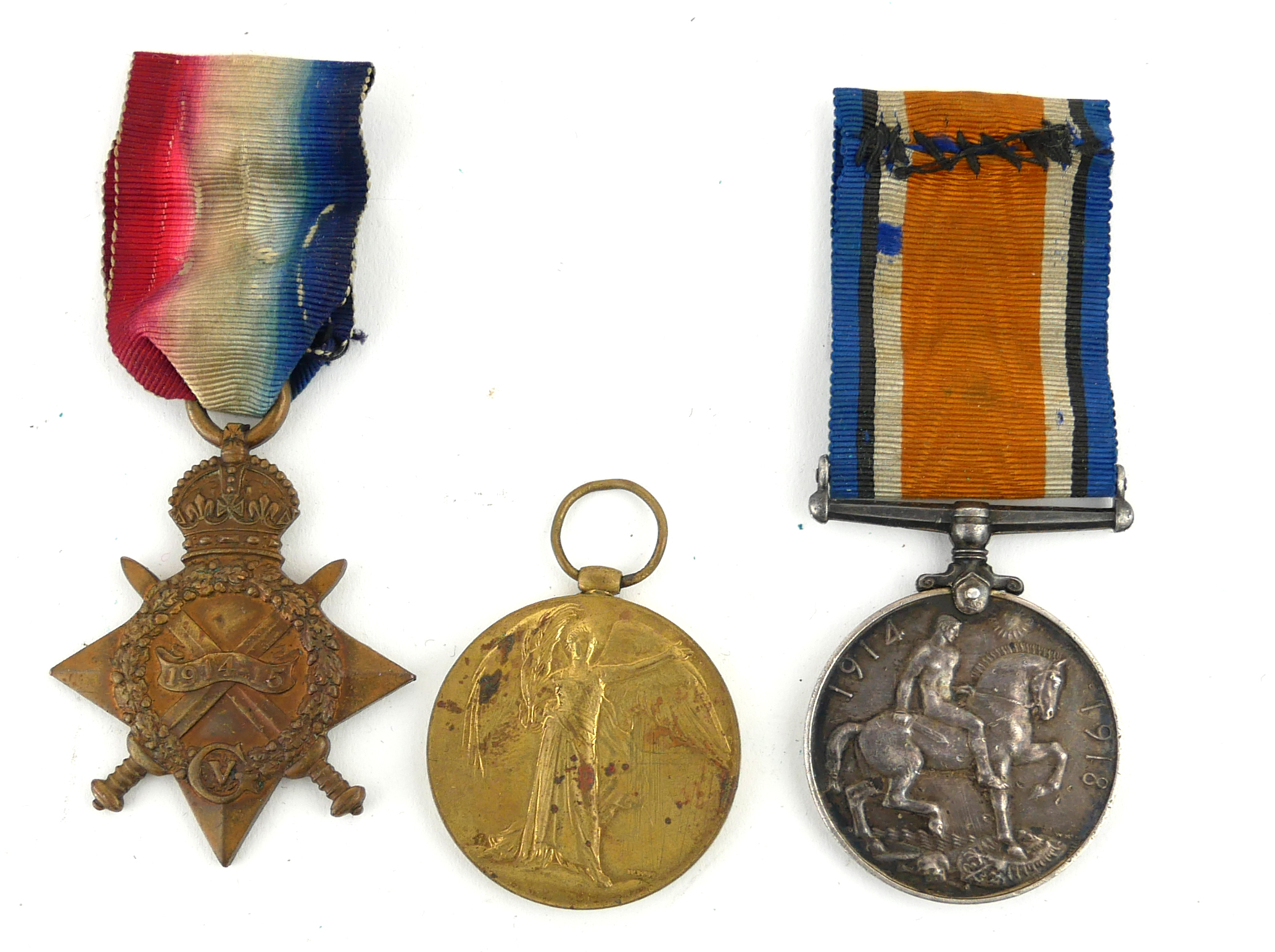 A SET OF THREE WWI BRITISH ARMY WAR MEDALS Silver medal, 1915/15 star and Great War for Civilisation