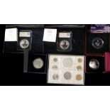 A COLLECTION OF SILVER COMMEMORATIVE COINS Comprising two Britannia coins, A 50th Anniversary of The