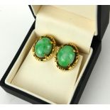 A PAIR OF 18CT GOLD AND OVAL JADE EARRINGS, CIRCA 1950.