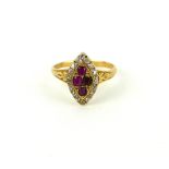 A VICTORIAN YELLOW METAL, RUBY AND SEED PEARL RING Having four square cut rubies edged with diamonds