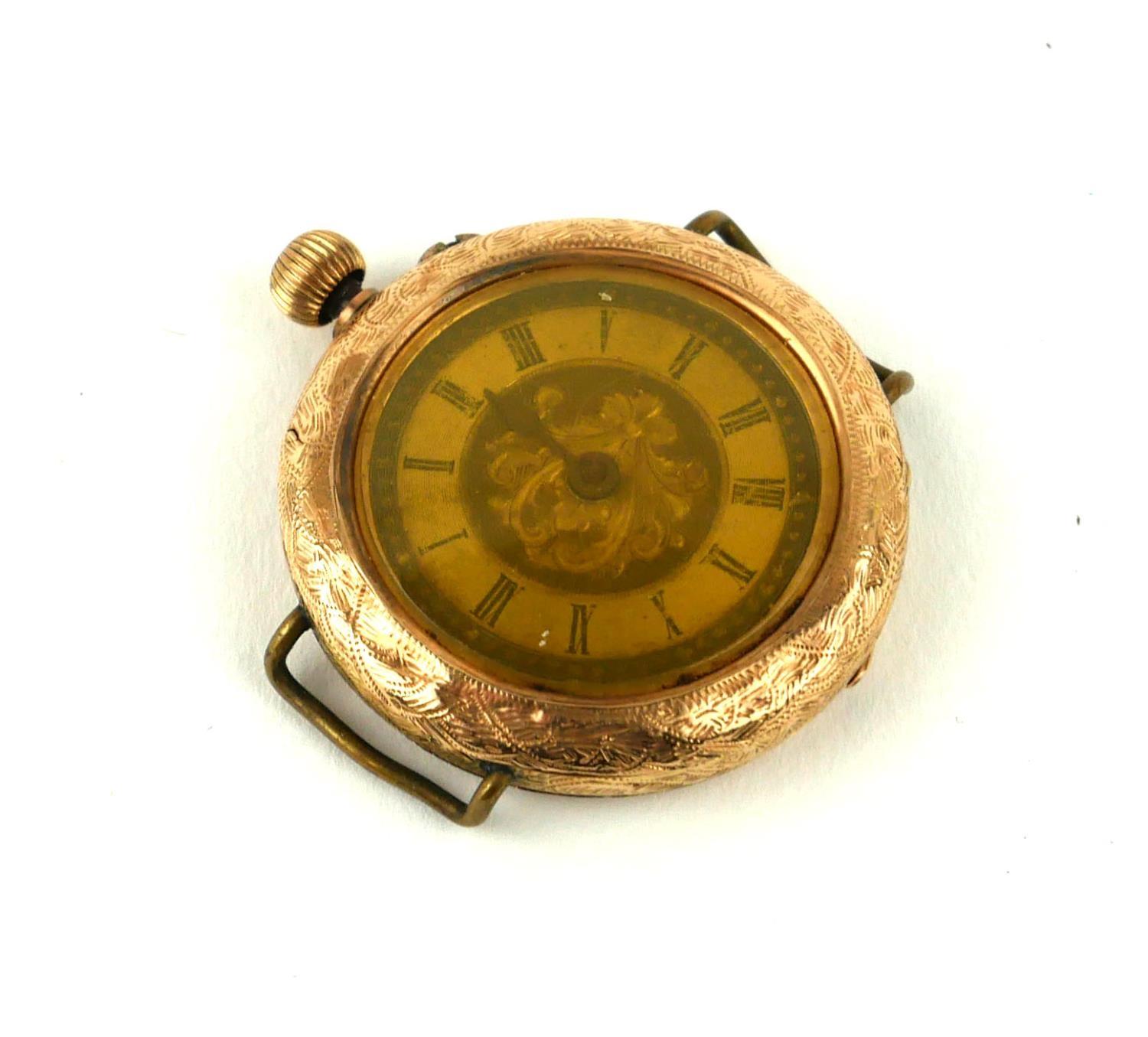 AN EARLY 20TH CENTURY 14CT GOLD WRISTWATCH Having an engraved outer case, dial and manual wind. (