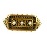 A 19TH CENTURY YELLOW METAL, BLACK ENAMEL AND SEED PEARL RECTANGULAR MOURNING BROOCH With graduating