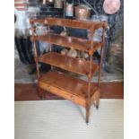 A 19TH CENTURY SATINWOOD FLOORSTANDING OPEN BOOKCASE With graduating shelves and lower drawer,