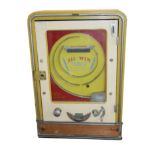AN EARLY 20TH CENTURY CAST METAL 'HAWTINS ALL WIN' PENNY ARCADE SLOT MACHINE Dome form top with