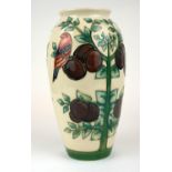 MOORCROFT, DESIGNED BY SALLY TUFFIN, A CASED PLUM RANGE VASE 1988/1990 (26.5cm) Condition: very