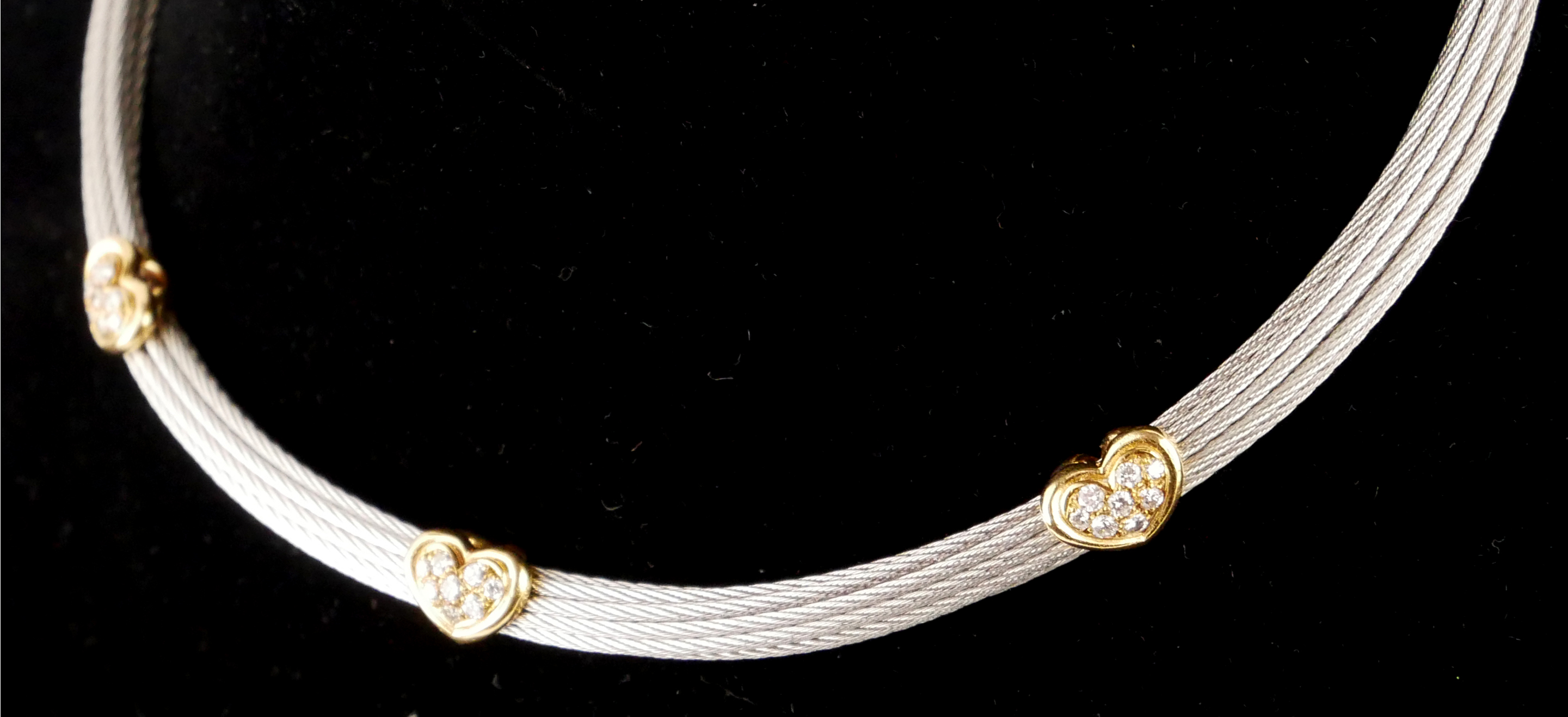 FRED, PARIS, AN 18CT GOLD AND SILVER COLLAR NECKLACE PAVÉ SET WITH DIAMOND HEARTS.
