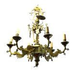IN THE MANNER OF AUGUSTUS PUGIN, 1812 - 1852, A 19TH CENTURY BRASS CHANDELIER Six branches with