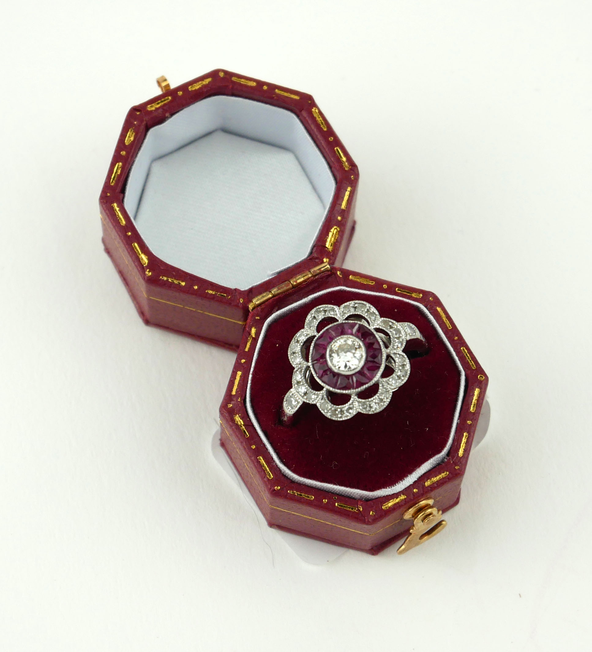 AN 18CT WHITE GOLD, RUBY AND DIAMOND FLOWER RING (size M½). - Image 2 of 2