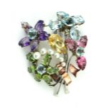 A WHITE AND ROSE GOLD, PEARL, AQUAMARINE, PERIDOT, AMETHYST AND CITRINE SPRAY BROOCH, CIRCA 1950.