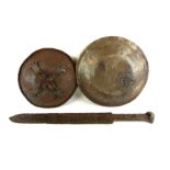 TWO ANTIQUE STEEL SHIELDS ALONG WITH A SHORT SWORD (sword 51cm) Condition: heavy rust