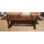 AN 17TH CENTURY DESIGN SOLID OAK REFECTORY TABLE With square and turned legs joined by stretchers.