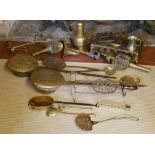 A COLLECTION OF 18TH CENTURY AND LATER BRASS AND STEEL To include bedpans, ladles, trivets and coach