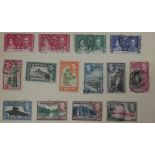 A COLLECTION OF TWELVE VINTAGE WORLD POSTAGE STAMP ALBUMS Including King George VI and later