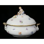 MEISSEN, AN EARLY 20TH CENTURY LARGE PORCELAIN FIGURAL TUREEN AND COVER Having a cherub form finial,