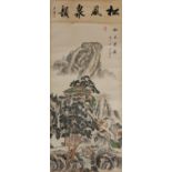 A CHINESE SCROLL PAINTED WITH MOUNTAIN TOP PAGODAS.