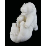 A CARVED ESKIMO SOAPSTONE STATUE, polar bears Condition: good