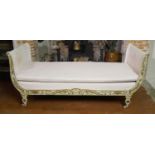 A 19TH CENTURY SCROLL END IRON DAYBED Cast with foliage, upholstered in a pale pink fabric with