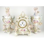 THURINGIAN, SITZENDORF, A LATE 19TH CENTURY HARD PASTE PORCELAIN FIGURATIVE MANTEL CLOCK