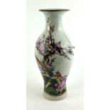 A CHINESE PORCELAIN VASE Decorated with exotic birds and fauna, bearing poetic inscription verso and