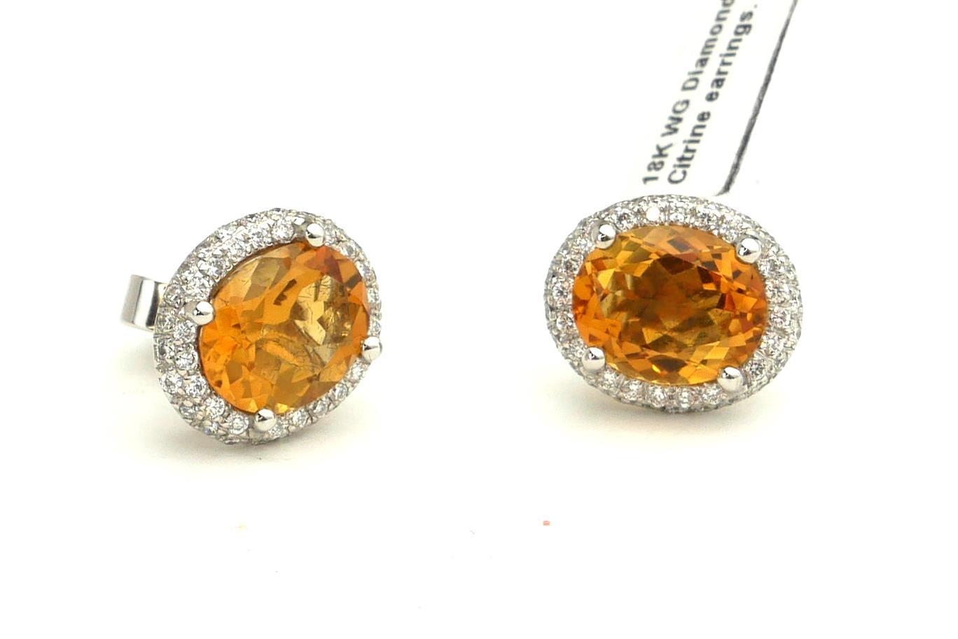 A PAIR OF 18CT WHITE GOLD, OVAL CITRINE AND DIAMOND EARRINGS. (1.3cm, 6.9g)