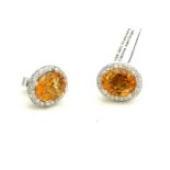 A PAIR OF 18CT WHITE GOLD, OVAL CITRINE AND DIAMOND EARRINGS. (1.3cm, 6.9g)