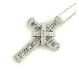 AN 18CT WHITE GOLD AND DIAMOND CROSS PENDANT NECKLACE The arrangement of baguette cut diamonds edged