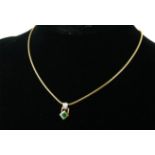 AN 18CT GOLD, EMERALD AND DIAMOND PENDANT.