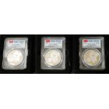 THREE CHINESE SILVER PANDA 10 YUAN COINS In protective capsules issued by PCGS MS70 x2 and MS69,