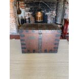 A 19TH CENTURY OAK AND IRON BOUND SILVER CHEST With several internal fitted trays and four heavy