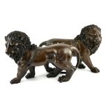 AFTER THE ANTIQUE, A PAIR OF BRONZE STATUES OF LIONS (31cm x 23cm) Condition: good